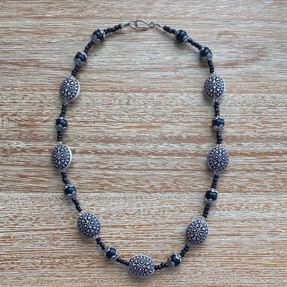 Necklace in Black and Silver tone beads with designs